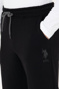 Pantaloni de trening uni conici