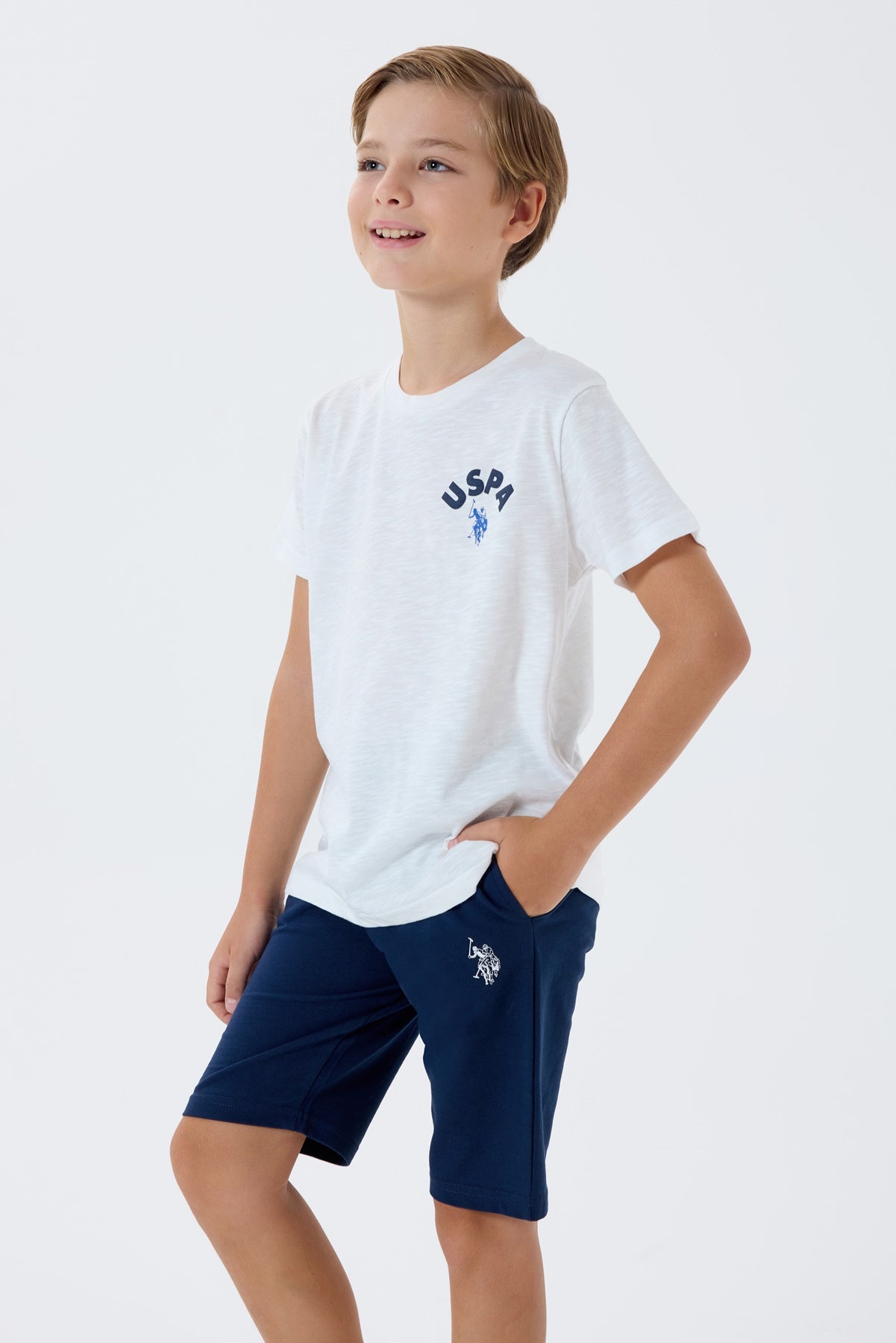 Set 2 Piese Băieți - Tricou Alb cu Print Logo Pe Spate Și Pantaloni Scurți  Bleumarin