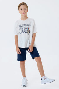 Set 2 Piese Băieți - Tricou Bej Deschis cu Print Logo Și Pantaloni Scurți  Bleumarin