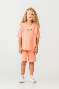 Set 2 Piese Fată - Tricou Și Pantaloni Scurți Oversize Orange Deschis Cu Logo USPA