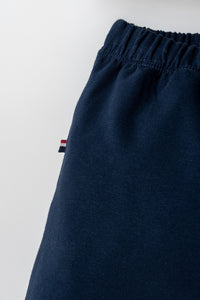 Set 2 Piese Băiețel Tricou Polo Alb Și Pantaloni Scurți Bleumarin Cu Logo Colorat